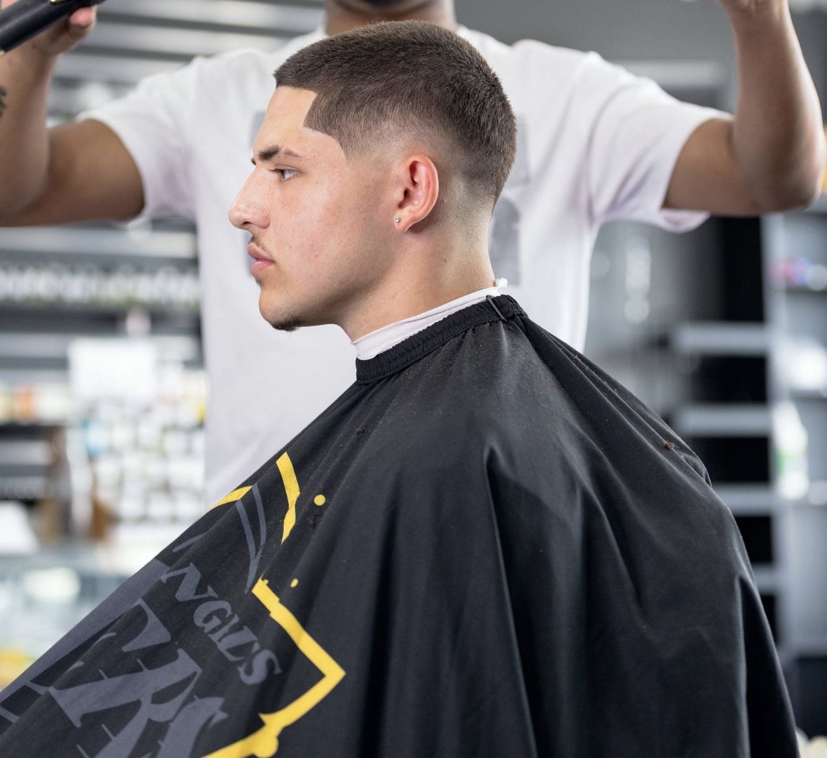 Low bald fade with sharp part, side view, TaeChoppedHim Mount Clemens MI