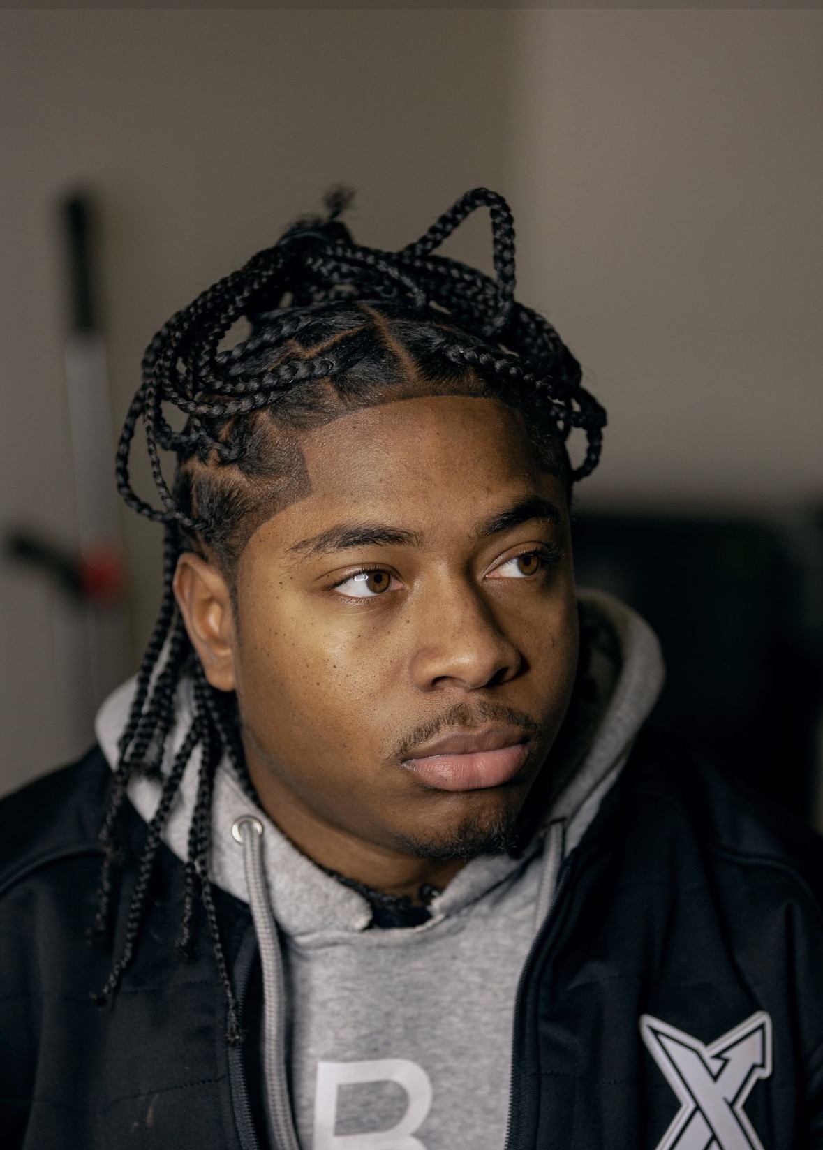 Braided style with clean shaved part design, TaeChoppedHim Mount Clemens MI